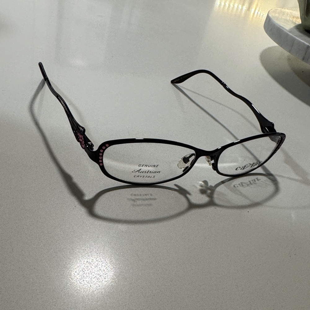 Chic Black Glasses with Pink Detailing